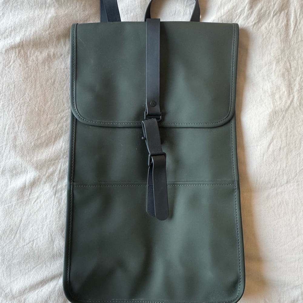Rains Green Minimalist Backpack with Water-Resistant Fabric